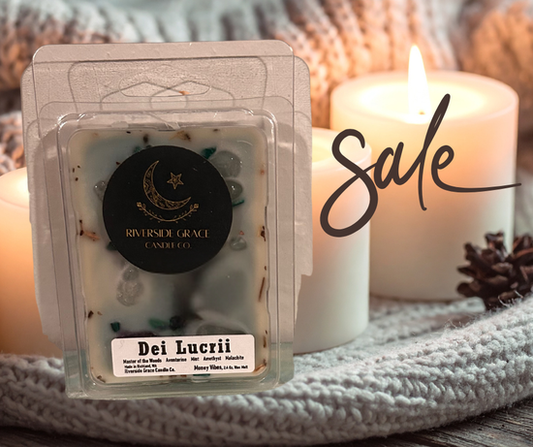 Handmade by Riverside Grace Candle Co.. Infused with Sodalite, Aventurine, and Amethyst. Intention: Money • Prosperity • Abundance. Slightly faded wax due to age — still fully usable