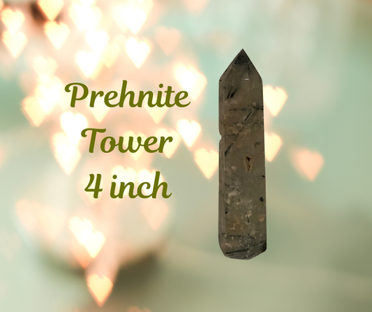 A polished 4‑inch Prehnite tower with soft green translucence and natural veils, offering calming, heart‑centered energy for intuition, healing, and meditation.