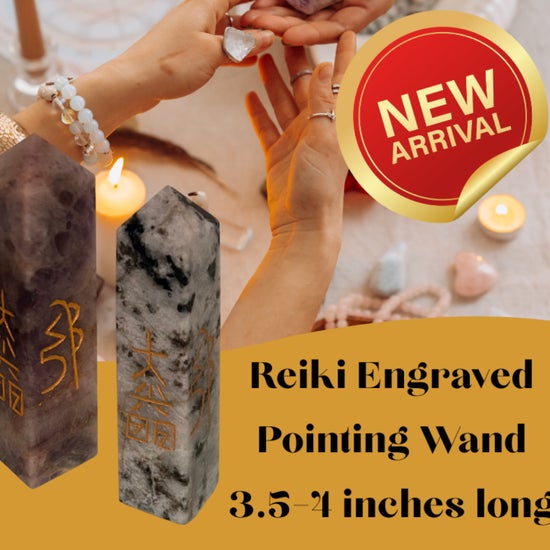 A 3.5–4 inch Reiki‑engraved crystal point featuring gold etching for focused intention work, energy alignment, meditation, and altar display.