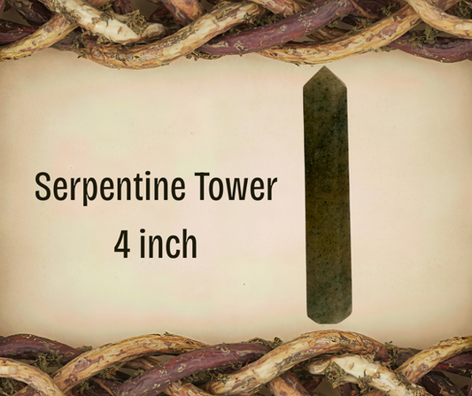 A 3.5–4 inch Serpentine tower with natural olive‑green marbling, offering grounding, soothing energy and supportive clearing for meditation or altar work.